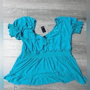 Torrid Eyelet Smocked
Waist And Sleeve Sweetheart
Blouse New With Tag